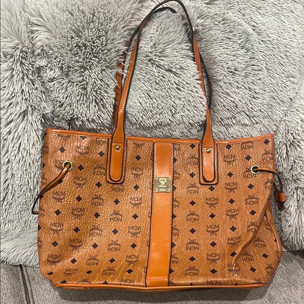 New, large, replica MGM bag, with inner tote and storage back. Never used